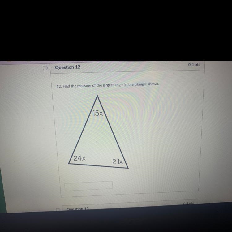 12. Find the measure of the largest angle in the triangle shown.-example-1