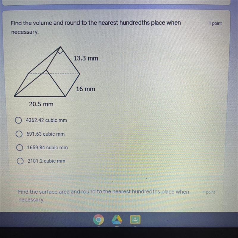 Find the volume and round to the nearest hundredths place when necessary.-example-1