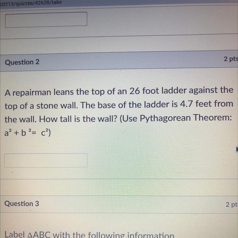 A repairman leans the top of an 26 foot ladder against the top of a stone wall. The-example-1