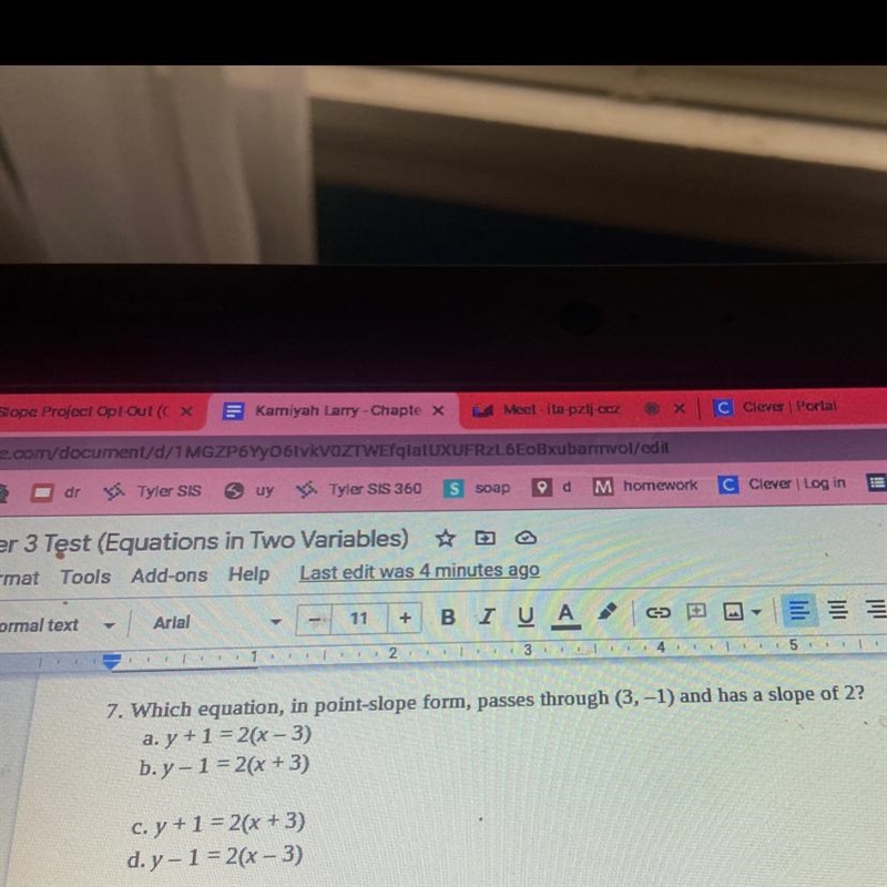 7. Which equation, in point-slope form, passes through (3,-1) and has a slope of 2? a-example-1