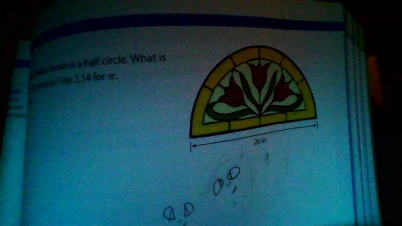 The stained glass window shown is a half circle. What is the perimeter of the window-example-1