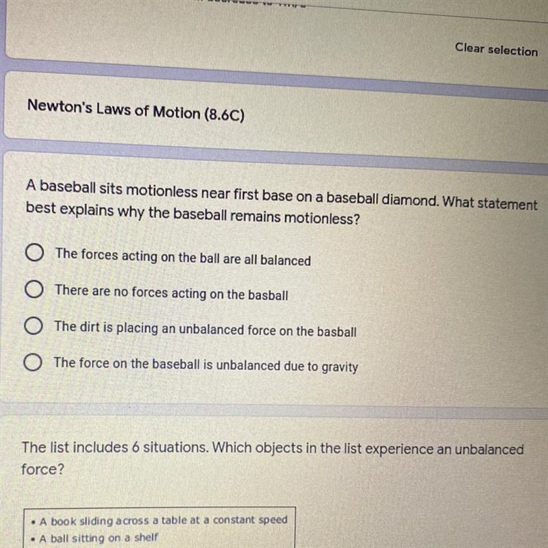 A baseball sits motionless near first base on a baseball diamond. What statement best-example-1