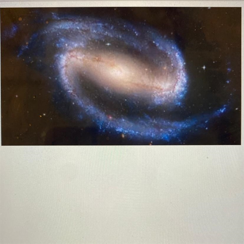 Which statement describes the image? This is an image of an elliptical galaxy. This-example-1