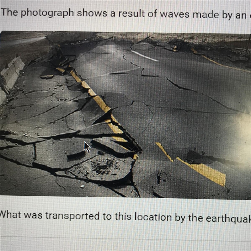 20 POINTS!!! The photograph shows a the result of waves made by an earthquake. What-example-1