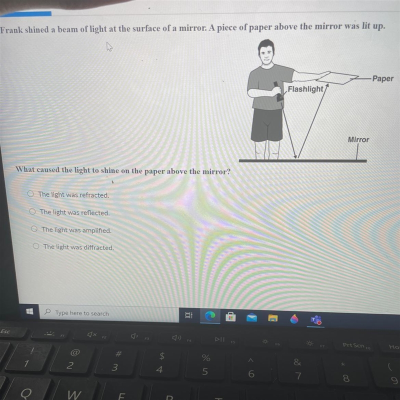 What caused the light to shine on the paper above the mirror? O The light was refracted-example-1