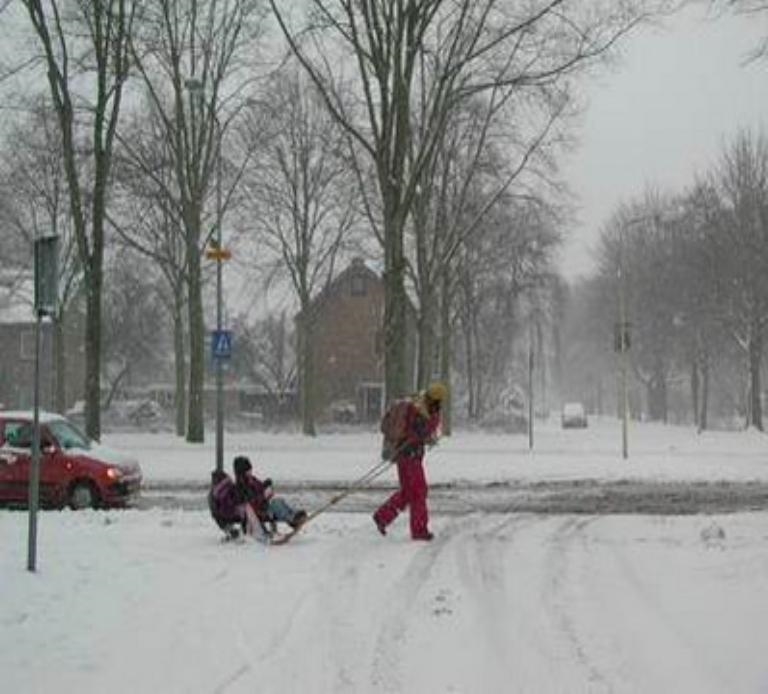 A mother is pulling a sled at constant velocity by means of a rope at 37°. The tension-example-1