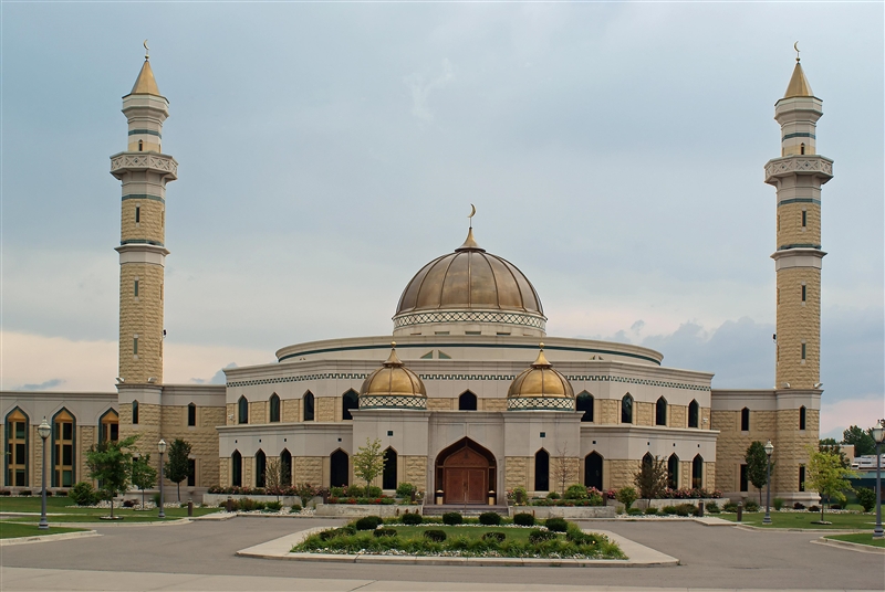 1. What similarities do you notice about both of these building? 2. What differences-example-2