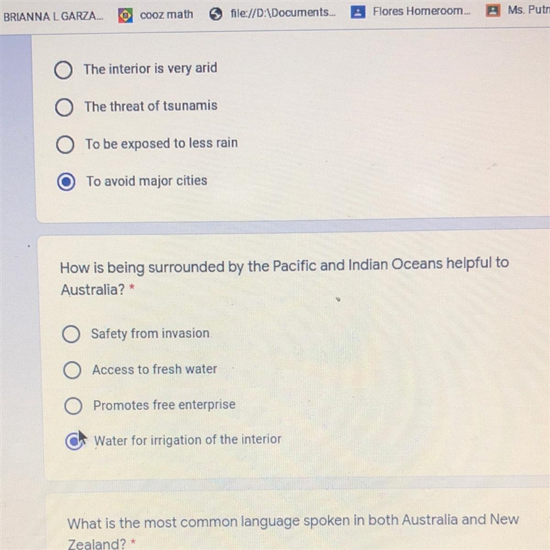 How is being surrounded by the Pacific and Indian Oceans helpful to Australia? Please-example-1