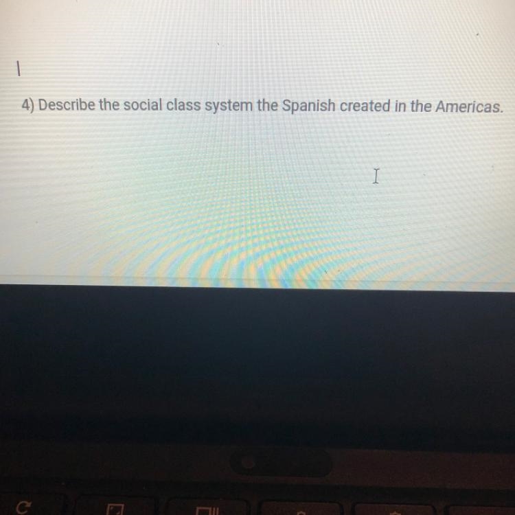 Describe the social class system the Spanish created in the Americas.-example-1