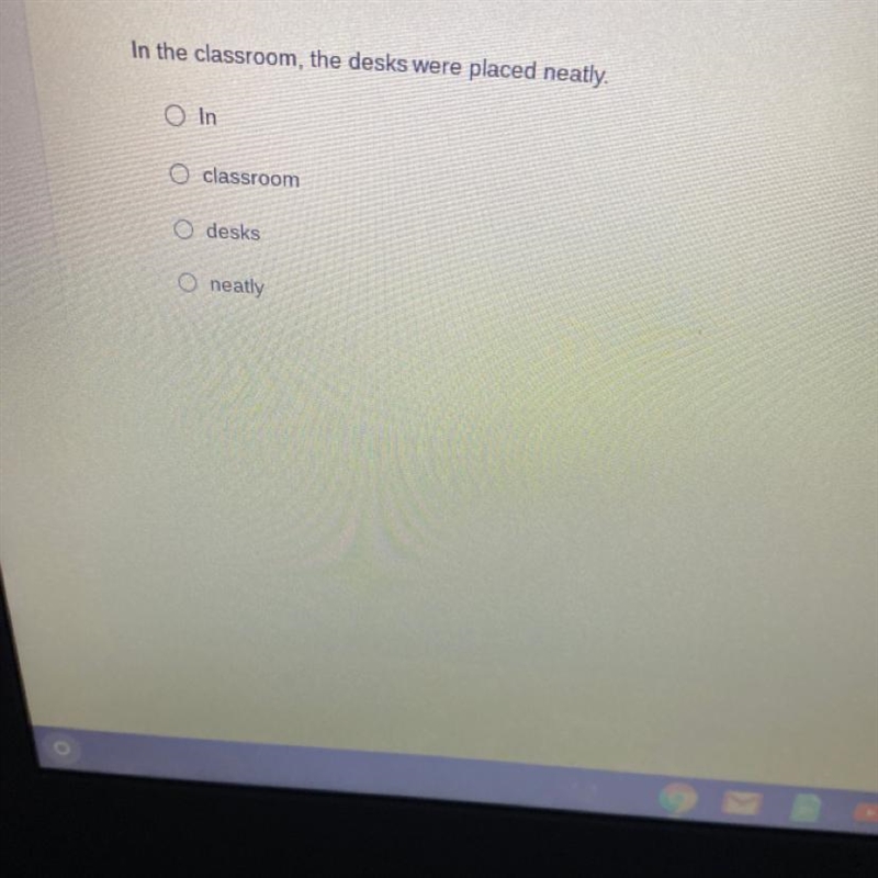 In the classroom, the desks were placed neatly. O In O classroom O desks O neatly-example-1