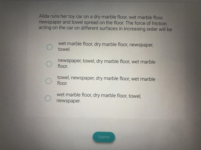 Alida runs her toy car on a dry marble floor, wet marble floor, newspaper and towel-example-1