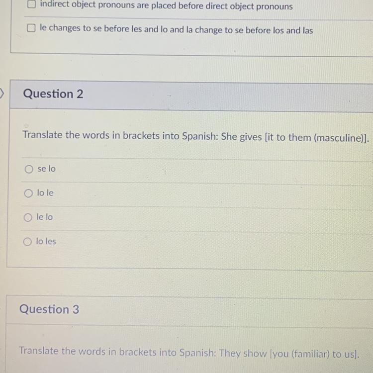 Translate the words in brackets to Spanish: She gives [it to them (masculine)]. a-example-1