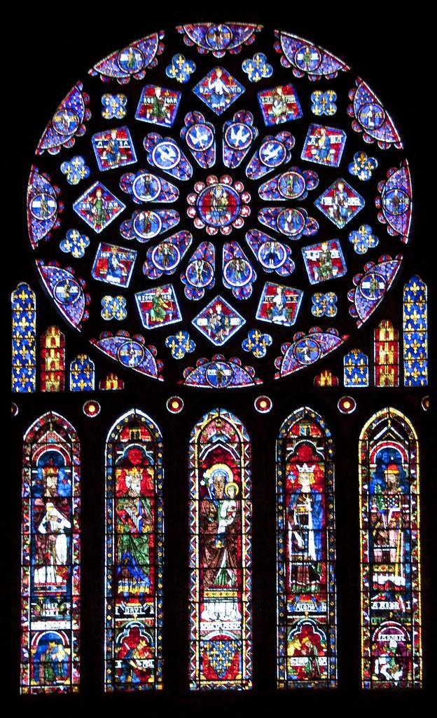 Refer to the image below and discuss which aspects of Chartres are Romanesque and-example-3