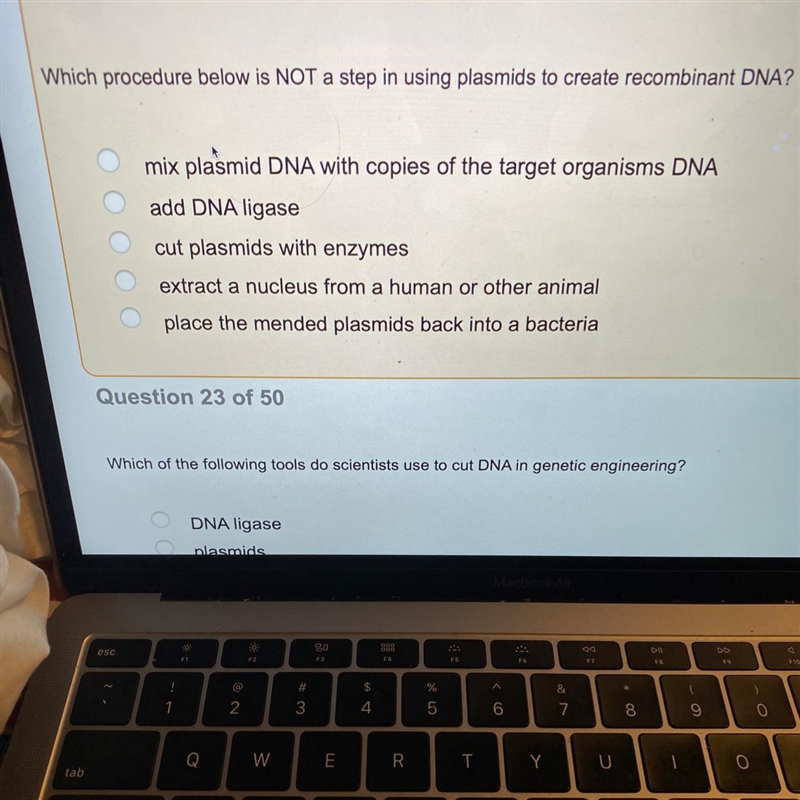 Which procedure below is not a step in using plasmids to create recombinant DNA?-example-1