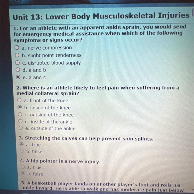 Where is an athlete likely to feel pain when suffering from a medial collateral sprain-example-1