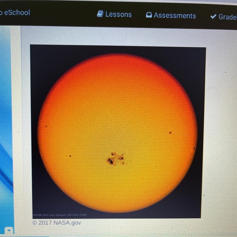 Which dark solar feature is shown in the picture above? A) Corona B) Prominence C-example-1