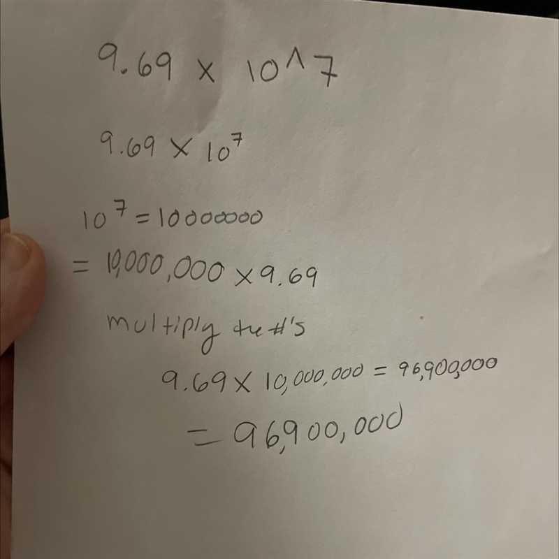 9.69 × 10^7 in decimal form-example-1