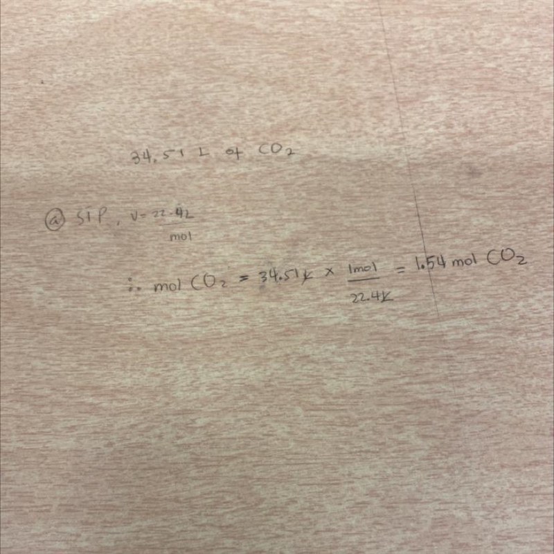 How many moles are in 34.51 L of C*O_{2} assuming the gas is at STP-example-1