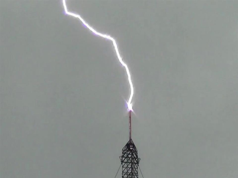 Lightning is caused by a. water droplets losing electrons when they collide in a cloud-example-2