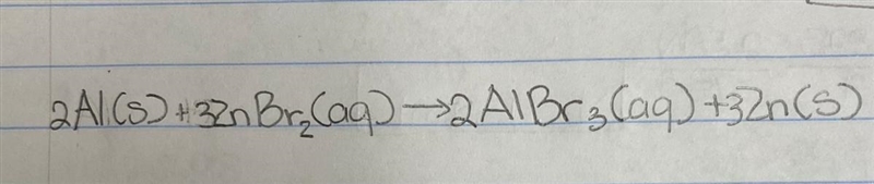 PLEAASE HELP Solid aluminum reacts with aqueous zinc bromide to form solid zinc and-example-1