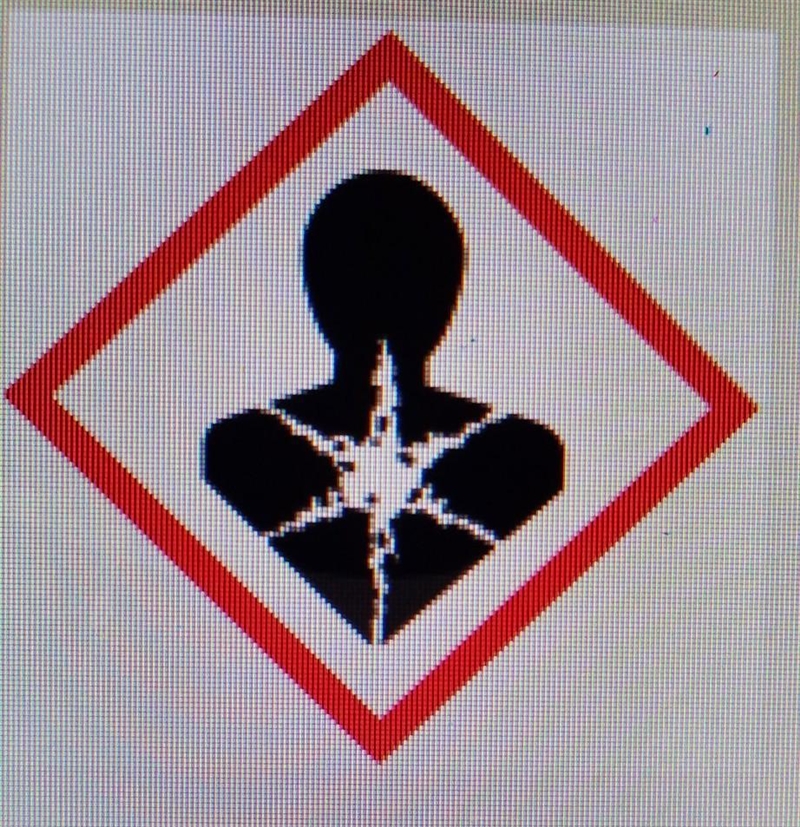 What does this symbol indicate about a chemical? A. The chemical is corrosive. B. The-example-1