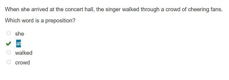 When she arrived at the concert hall, the singer walked through a crowd of cheering-example-1