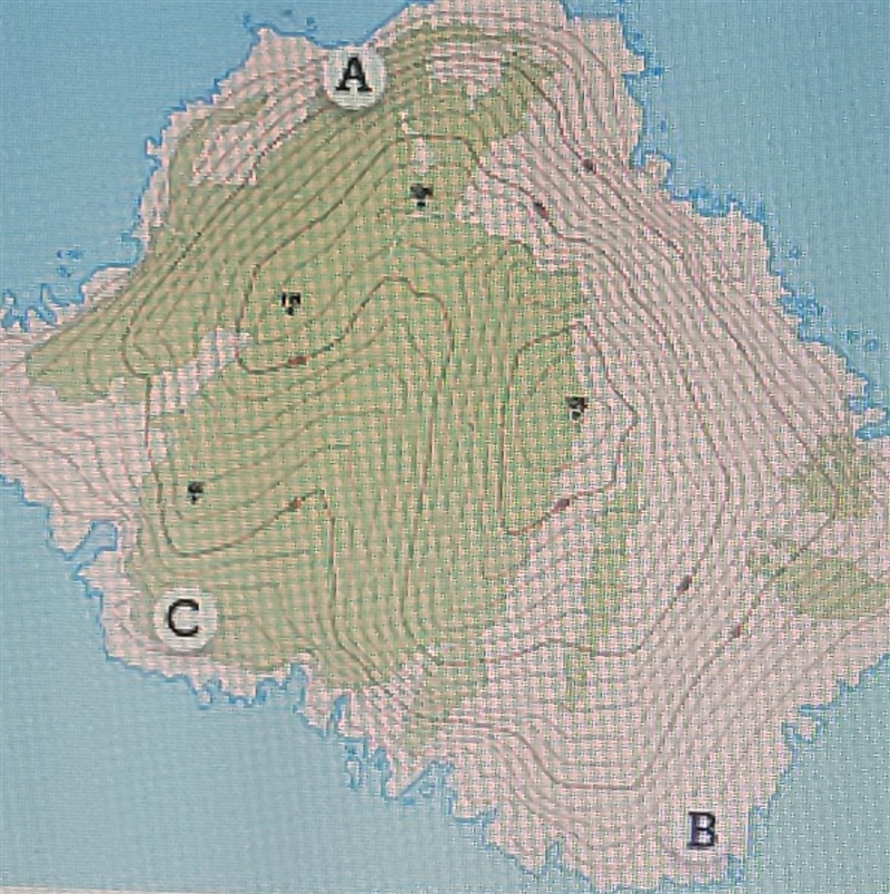 What kind of land feature is shown at point B on this topographic map? A. A deep canyon-example-1