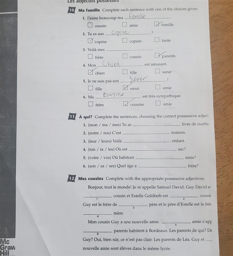 Les adjectifs possessifs 10 Ma famille Complete each sentence with one of the choices-example-1