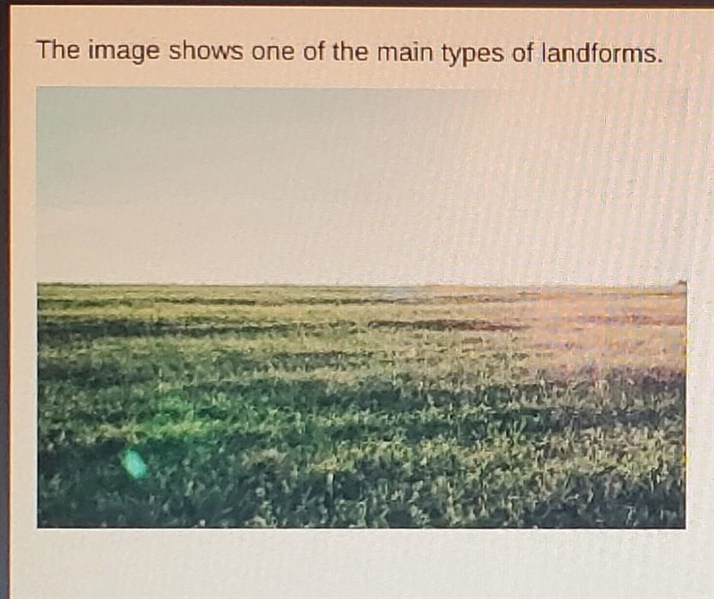 The image shows on of the main types of landforms which type of landform is shown-example-1