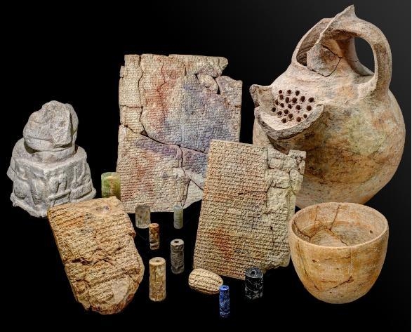 Based on the image below: a) Are the items in the image above considered ancient artifacts-example-1