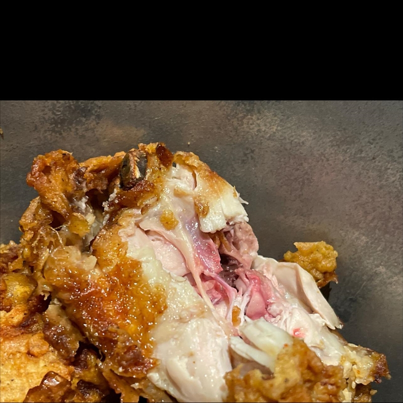 I saw some red stuff in the middle of my chicken is it safe to eat without getting-example-1