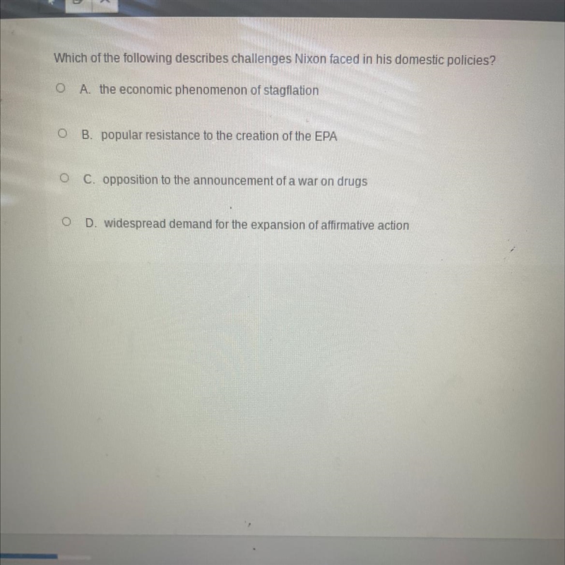 Which of the following describes challenges Nixon faced in his domestic policies?-example-1