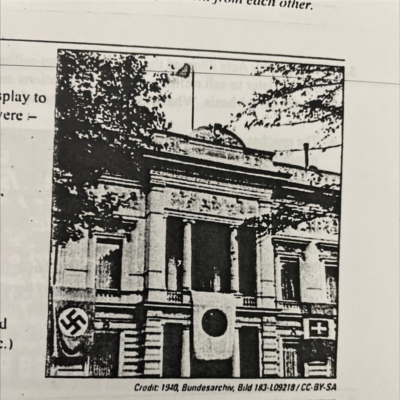 This 1940 image shows Japans embassy in Berlin with three flags on display to celebrate-example-1