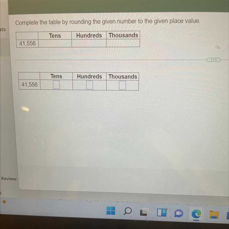 Complete the table by rounding the given number to the given place value-example-1