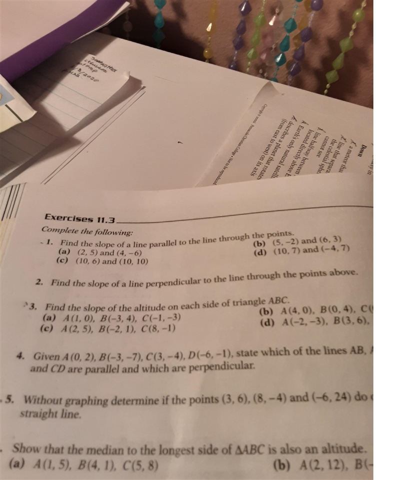 d the slope of the altitude on each side of triangle ABC. ises 11.3 Complete the following-example-1