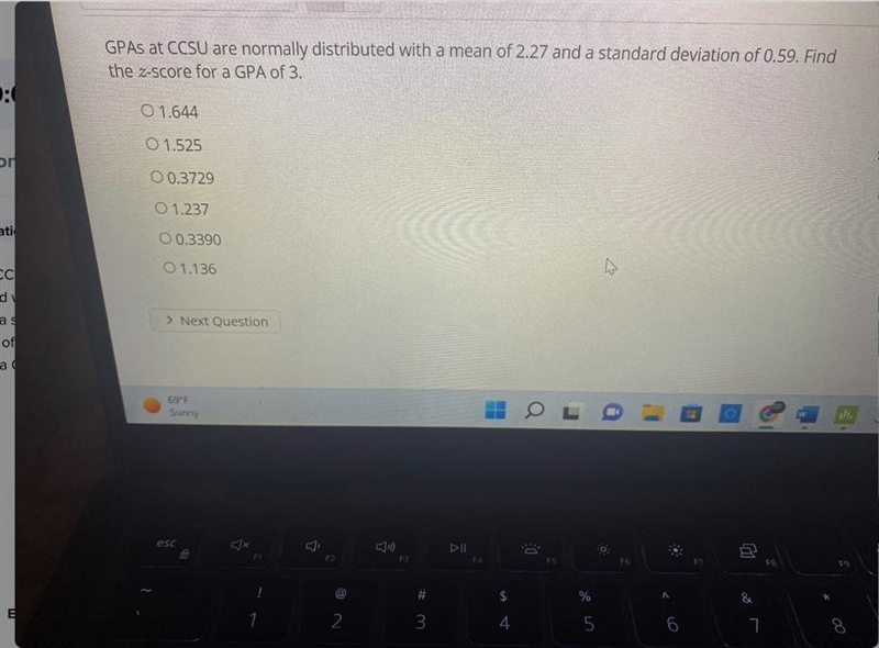 GPAs at CCSU are normally distributed with a mean of 2.27 and a standard deviation-example-1