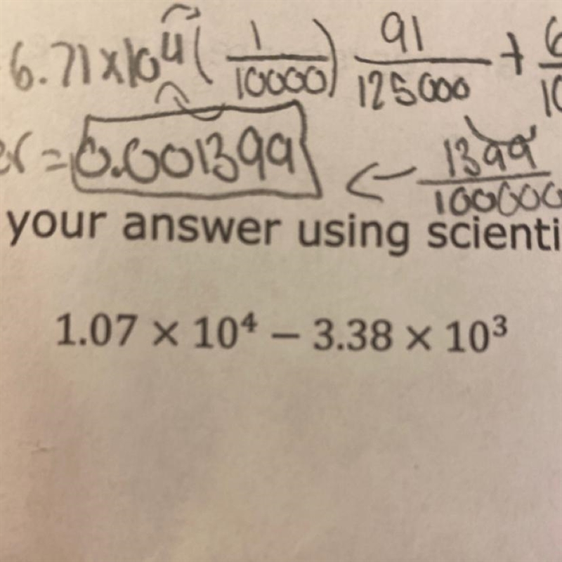 1.07 x 104 -3.38 × 10³-example-1