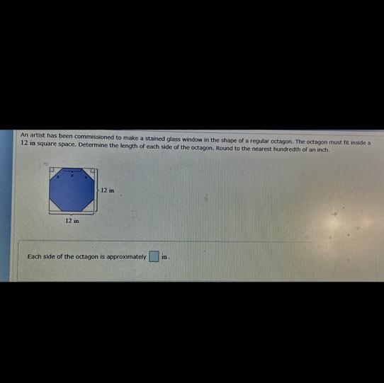 An artist has been commissioned to make a stained glass window in the shape of a regular-example-1