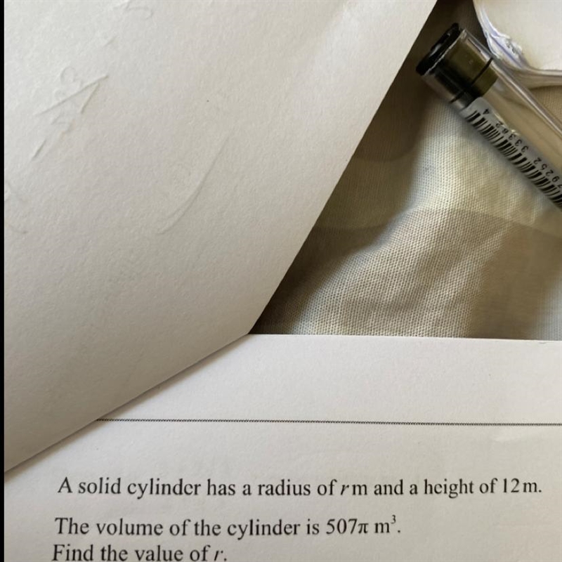 A solid cylinder has a radius of rm and a height of 12 m. The volume of the cylinder-example-1