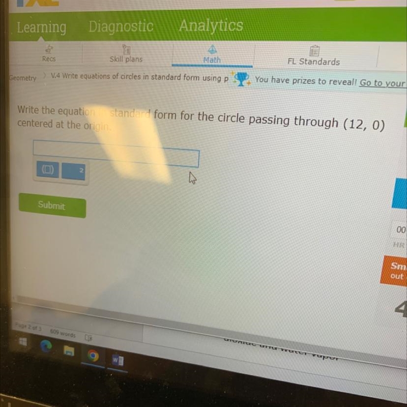 Write the equation in standard form for the circle passing through (12,0) centered-example-1