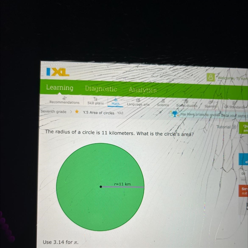 The radius of a circle is 11 kilometers. What is the circle's area? 11 km Use 3.14 for-example-1