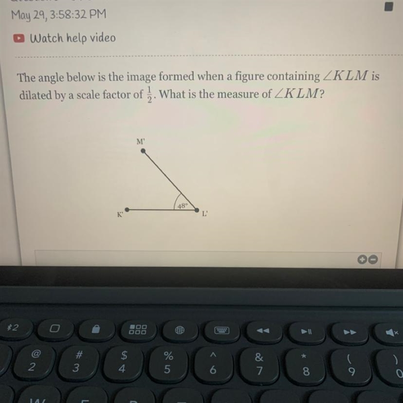 The angle below is the image formed when a figure containing /KLM is dilated by a-example-1