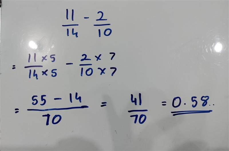 The difference 11/14 - 2/10-example-1