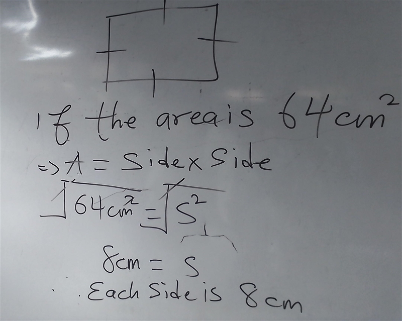 A square piece of cardboard has an area of 64 square inches. How long is each side-example-1