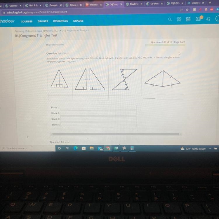 Identify how the two trianiges are congruent. Fill in the blank below the triangles-example-1