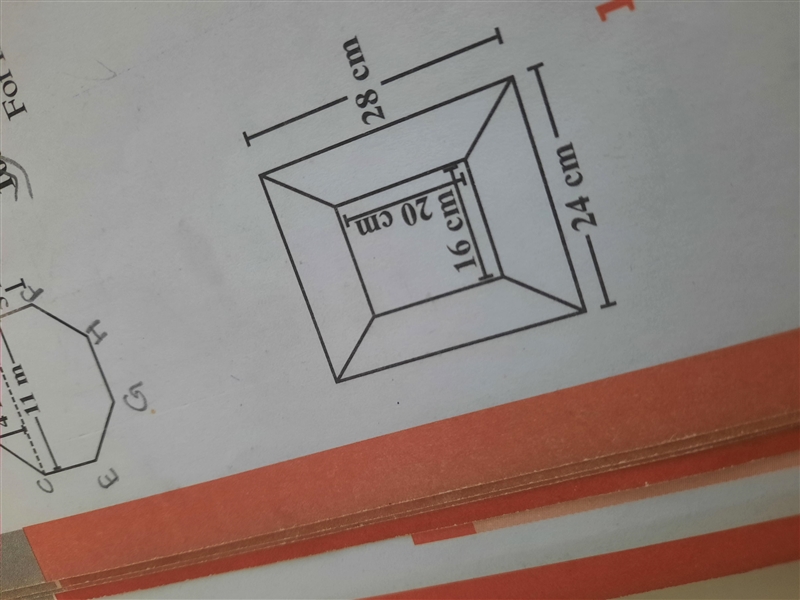 Diagram of the adjacent picture frame has outer dimensions = 24 cm x 28 cm and inner-example-1