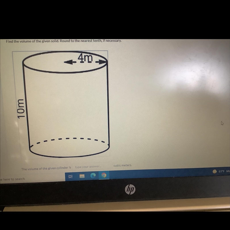 Find the volume of the given solid. Round to the nearest tenth if necessary-example-1