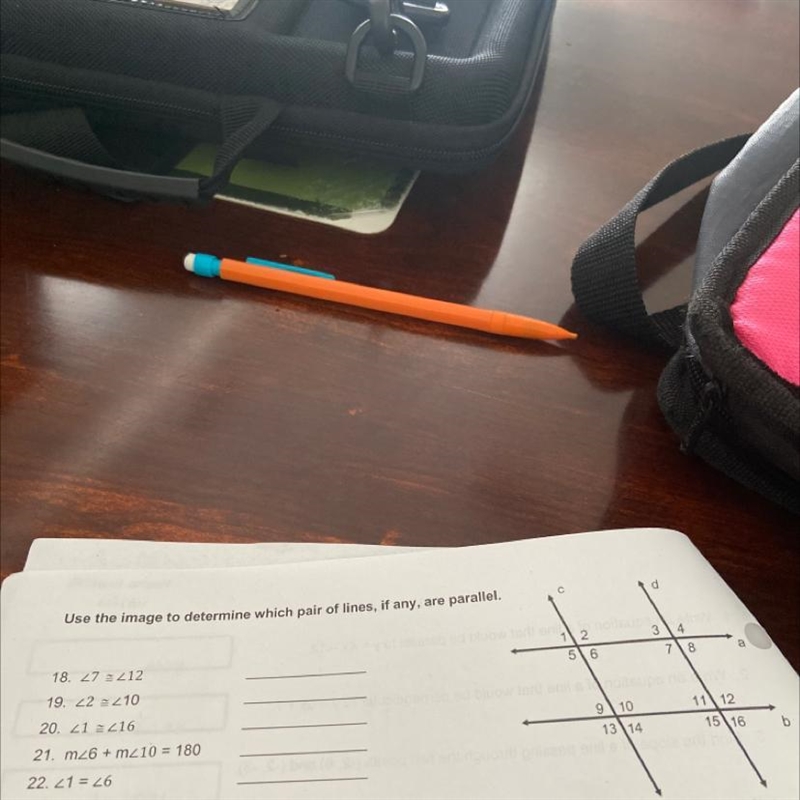 Use the image to determine which pair of lines, if any, are parallel.-example-1