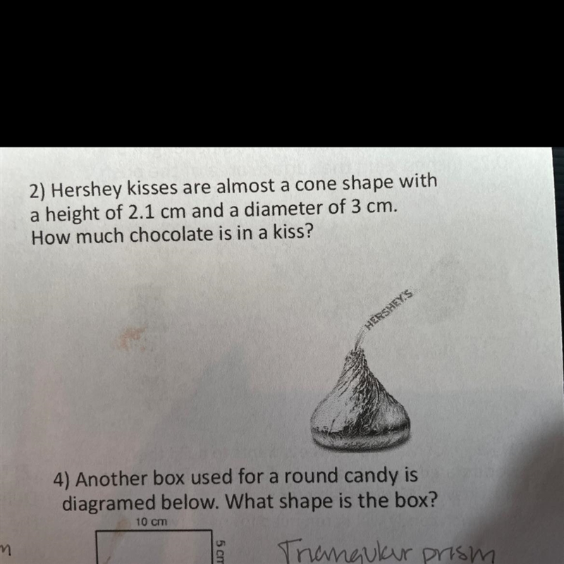 Hershey kisses are almost a cone shape witha height of 2.1 cm and a diameter of 3 cmHow-example-1