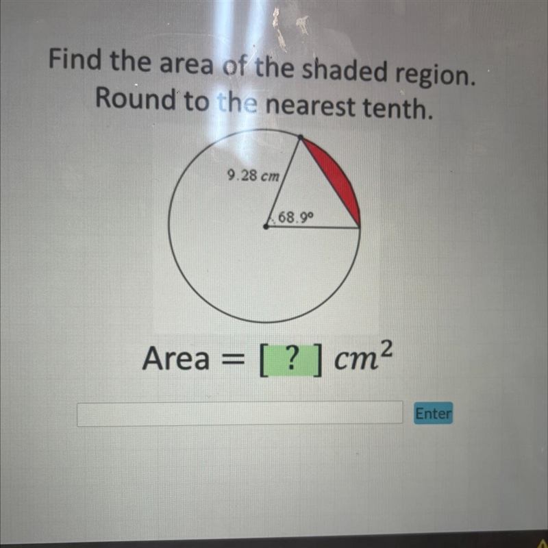 Find the area of the shaded region. Round to the nearest tenth. 9.28cm 68.9°-example-1